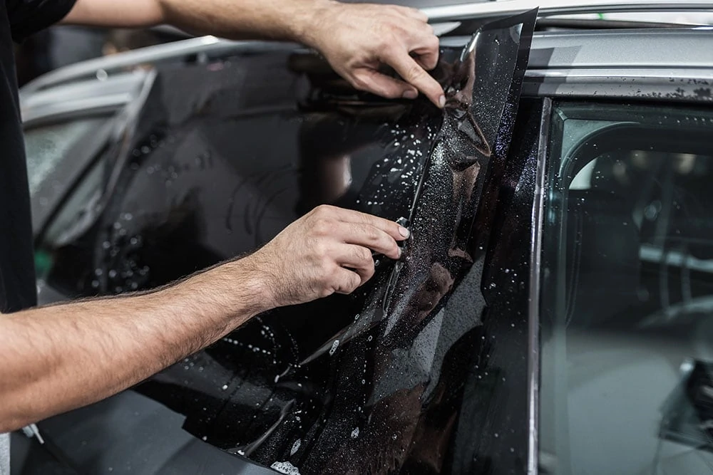 Rear side window tint on a vehicle
